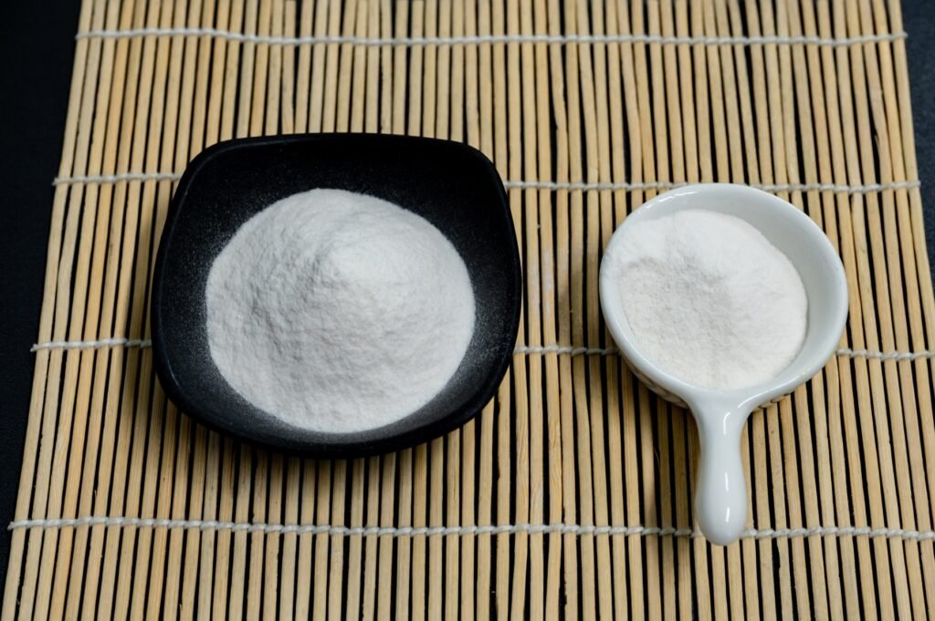Agar agar powder displayed on a natural bamboo surface
